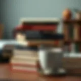 A stack of classic financial literature with a cup of coffee