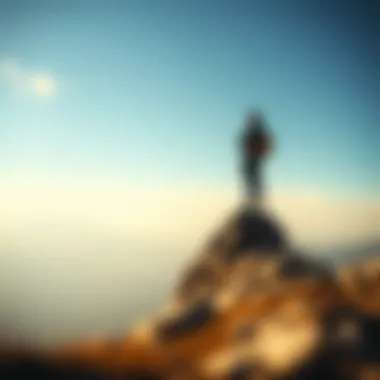 A person standing triumphantly on a mountain peak, symbolizing achievement and success.
