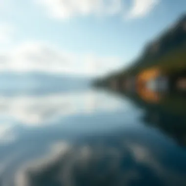 A calm water surface reflecting a clear sky