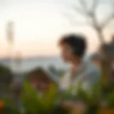 Immersed in Audiobooks A person immersed in listening to an audiobook in a serene outdoor setting