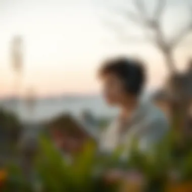 Immersed in Audiobooks A person immersed in listening to an audiobook in a serene outdoor setting
